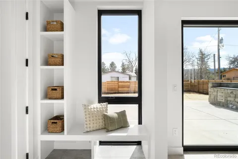 a view of a workspace with furniture