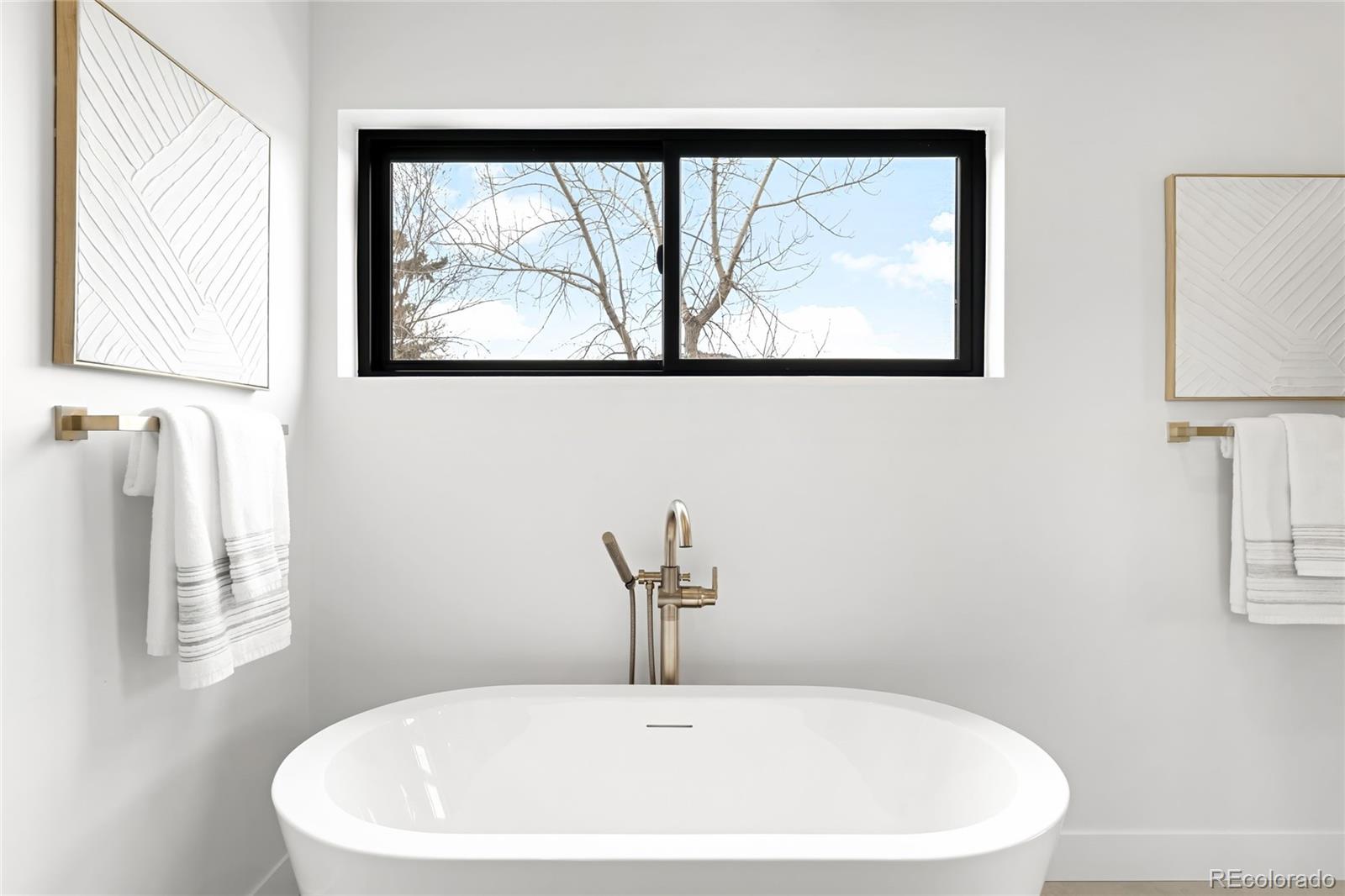 2170 Vine Avenue Boulder, CO 80304 - Photo 28 of 49 a white bath tub sitting next to a window