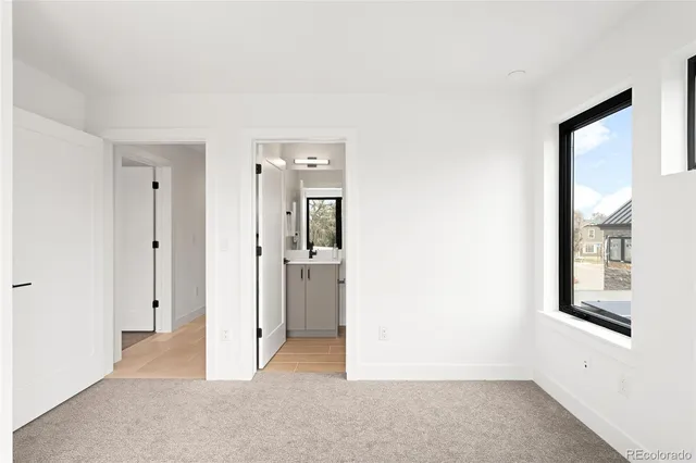 a view of a hallway with windows