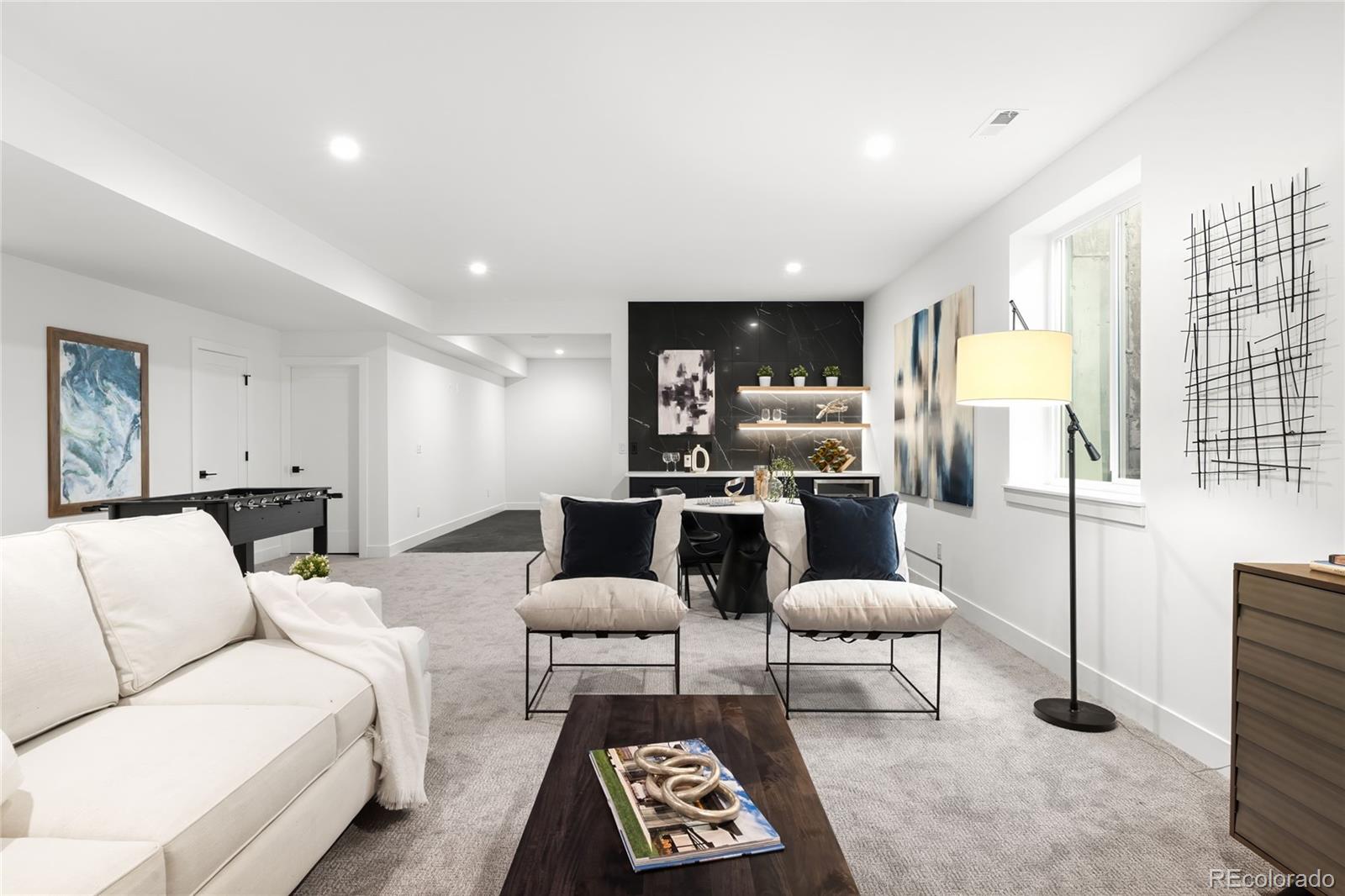 2170 Vine Avenue Boulder, CO 80304 - Photo 40 of 49 a living room with furniture and a wooden floor