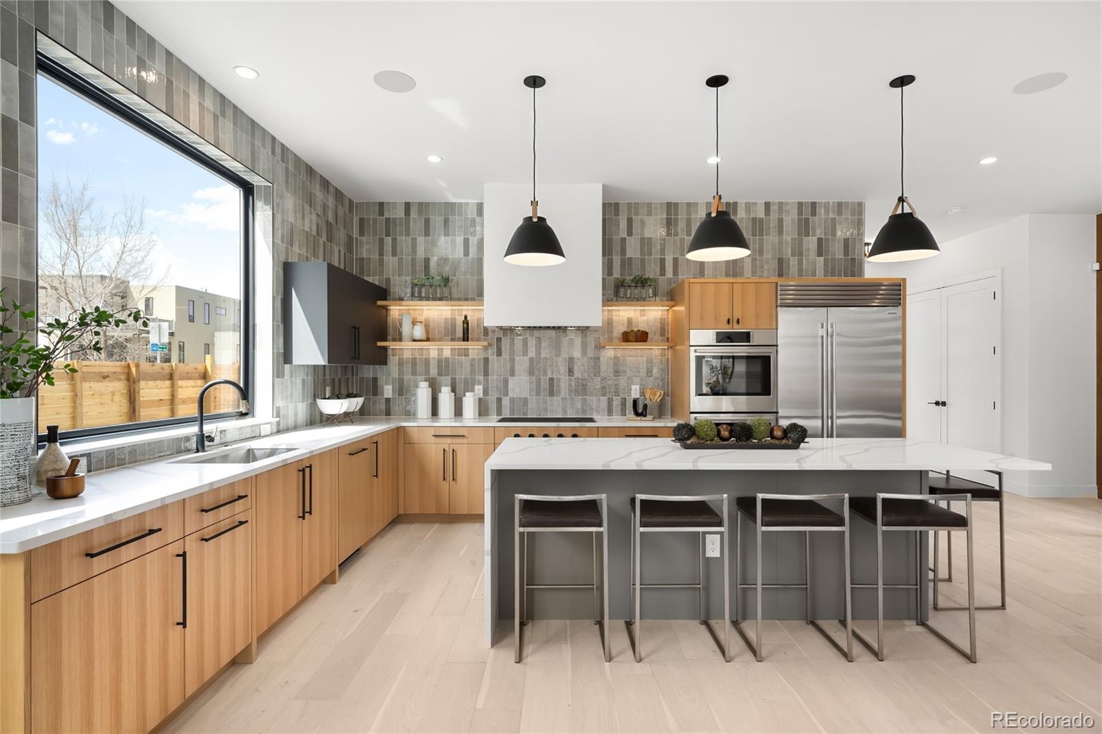 2170 Vine Avenue Boulder, CO 80304 - Photo 4 of 49 a kitchen with stainless steel appliances granite countertop sink stove and white cabinets