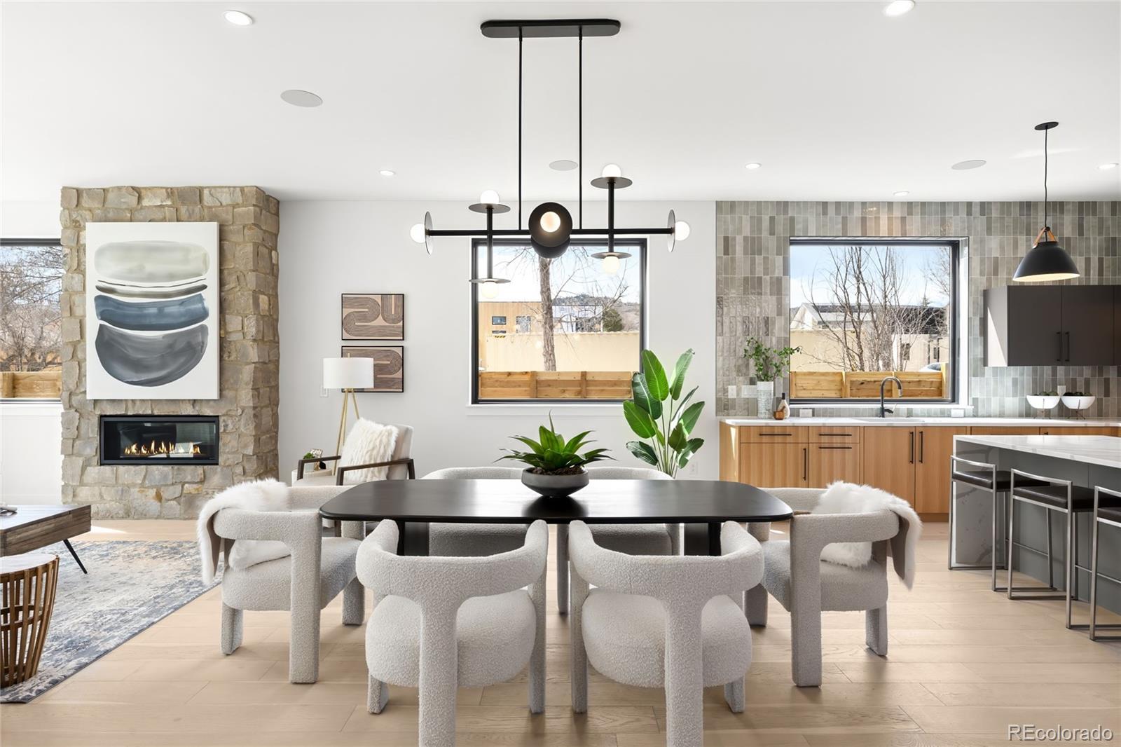 2170 Vine Avenue Boulder, CO 80304 - Photo 9 of 49 a dining room with furniture a chandelier and window