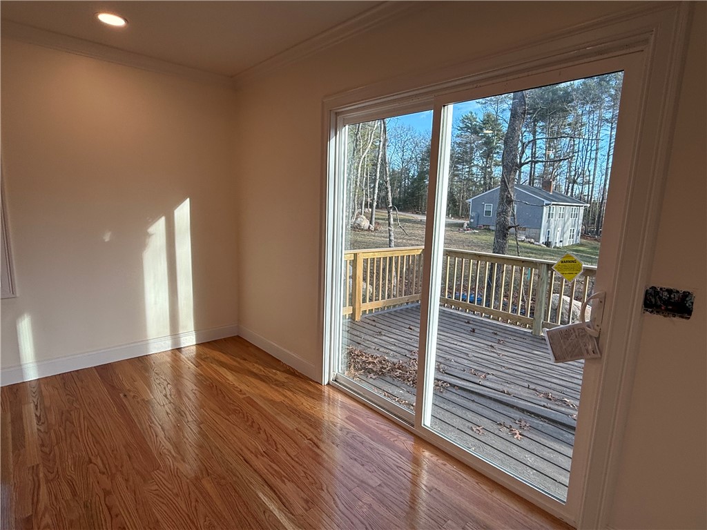 739 Victory Highway West Greenwich, RI 02817 - Photo 16 of 23 sliding doors lead out to deck