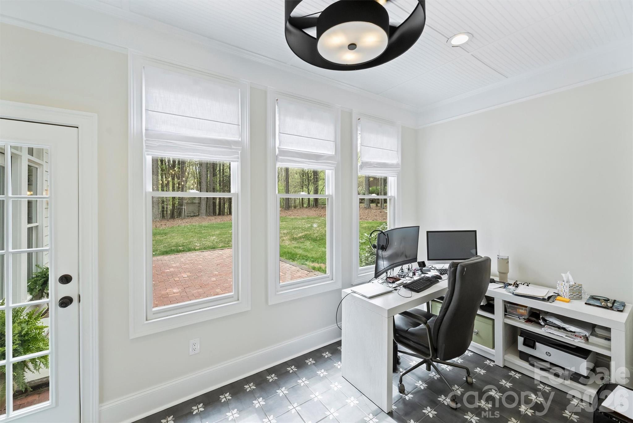 271 Beaten Path Road Mooresville, NC 28117 - Photo 20 of 47 a workspace with furniture and a window