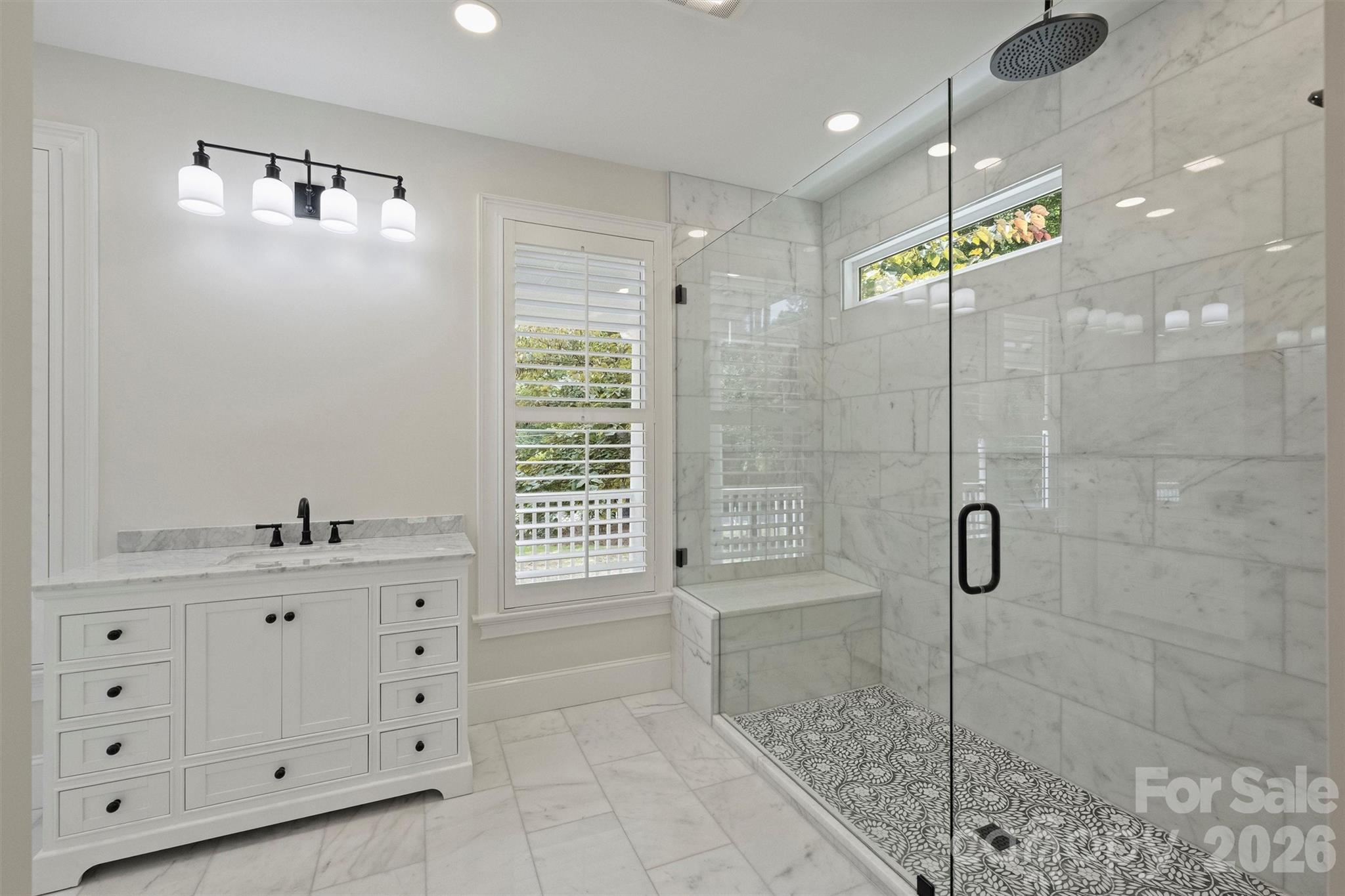 271 Beaten Path Road Mooresville, NC 28117 - Photo 25 of 47 a bathroom with a granite countertop sink a mirror a vanity and a shower