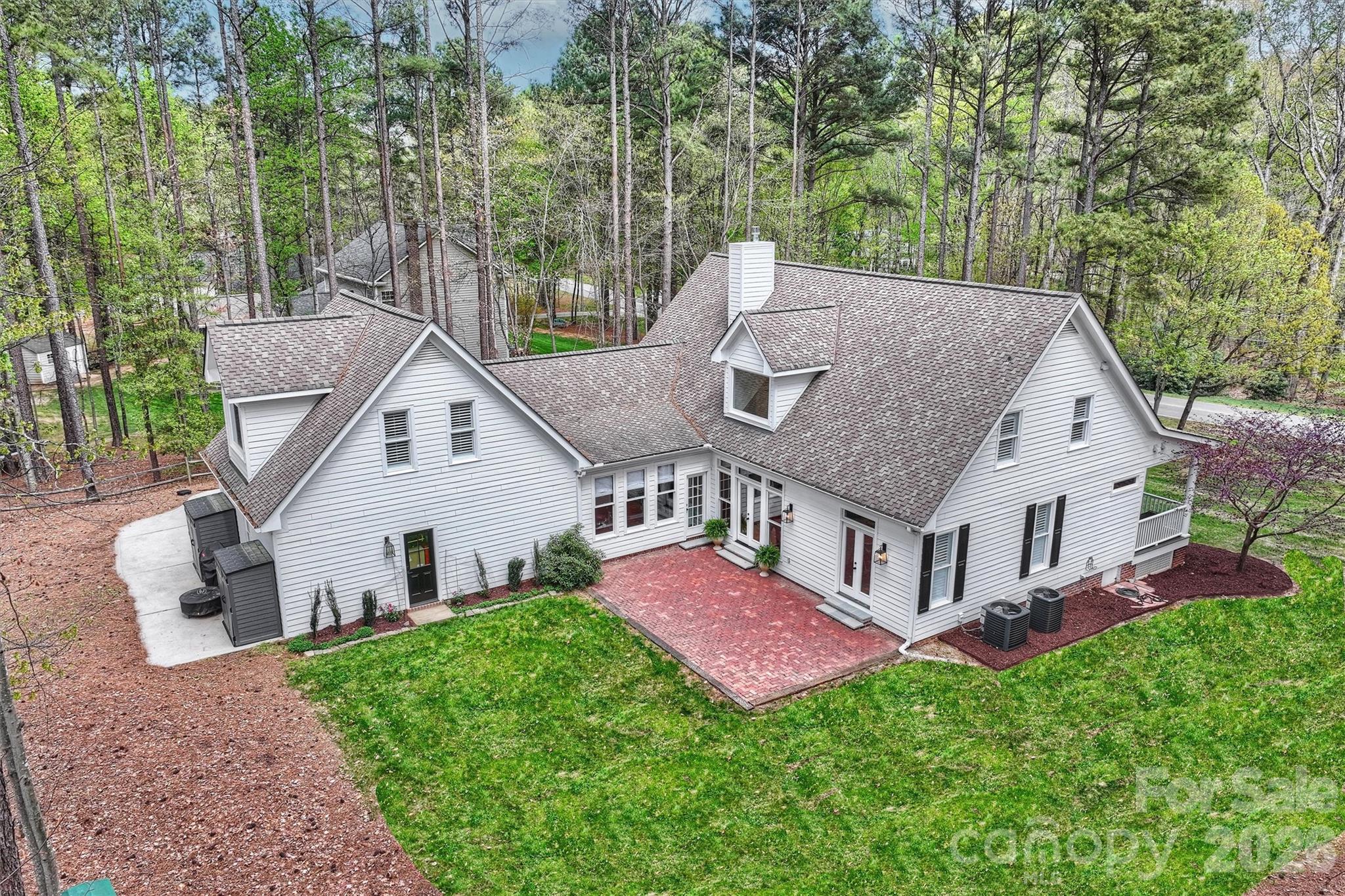 271 Beaten Path Road Mooresville, NC 28117 - Photo 37 of 47 a view of house with yard and trees in the background