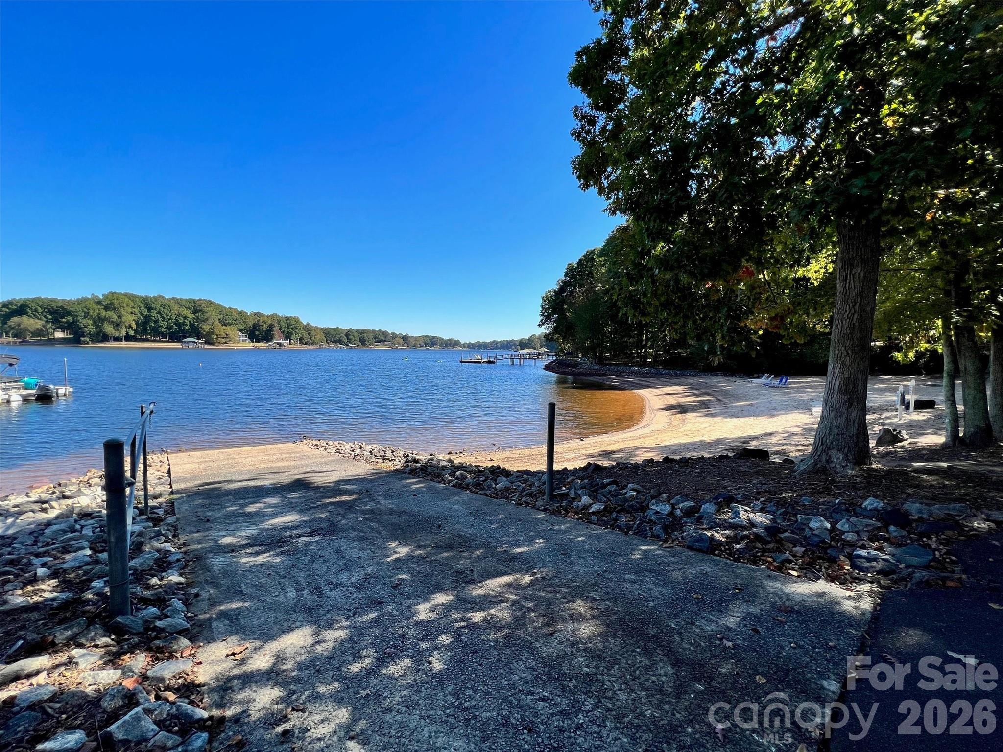 271 Beaten Path Road Mooresville, NC 28117 - Photo 41 of 47 a view of a lake with a mountain in the background