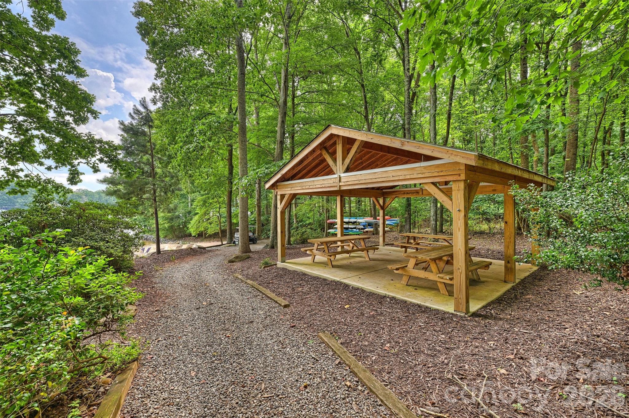 271 Beaten Path Road Mooresville, NC 28117 - Photo 43 of 47 a view of a wooden deck with a patio