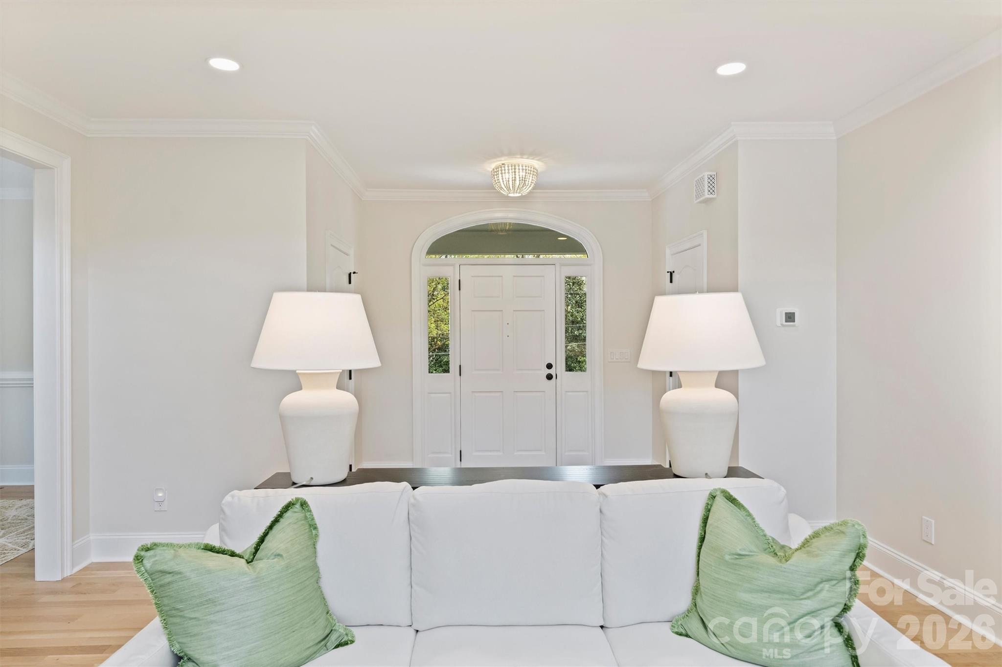 271 Beaten Path Road Mooresville, NC 28117 - Photo 9 of 47 a living room with furniture a lamp and a chandelier