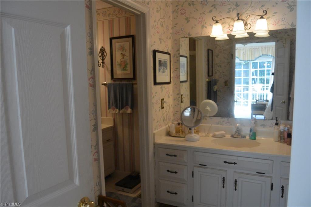 552 Lindley Road Greensboro, NC 27410 - Photo 14 of 30 Master bath has separate sink, commode and shower for privacy