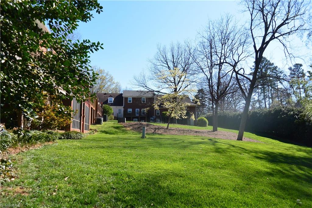 552 Lindley Road Greensboro, NC 27410 - Photo 28 of 30 All this beautiful grass right outside your door and you don't have to do a thing to it!