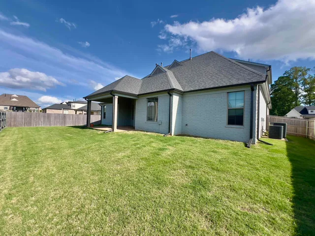 a house view with a garden space
