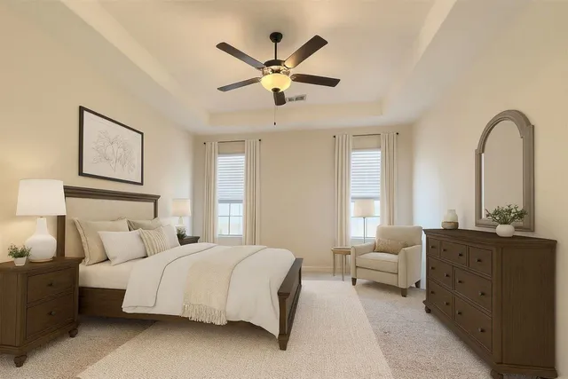 a bedroom with bed and window