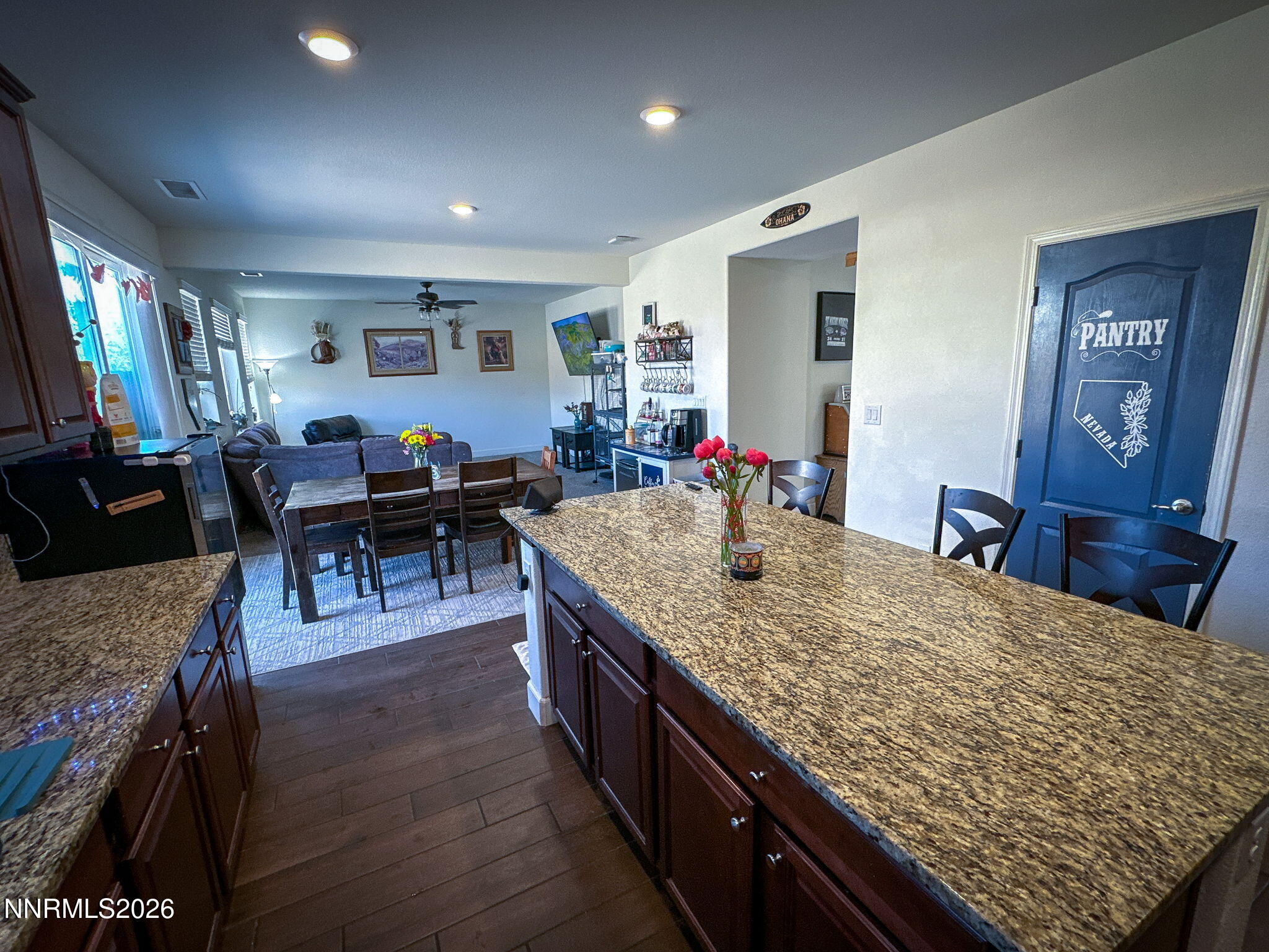 7330 Overture Drive Reno, NV 89506 - Photo 2 of 17 a view of a dining room with furniture