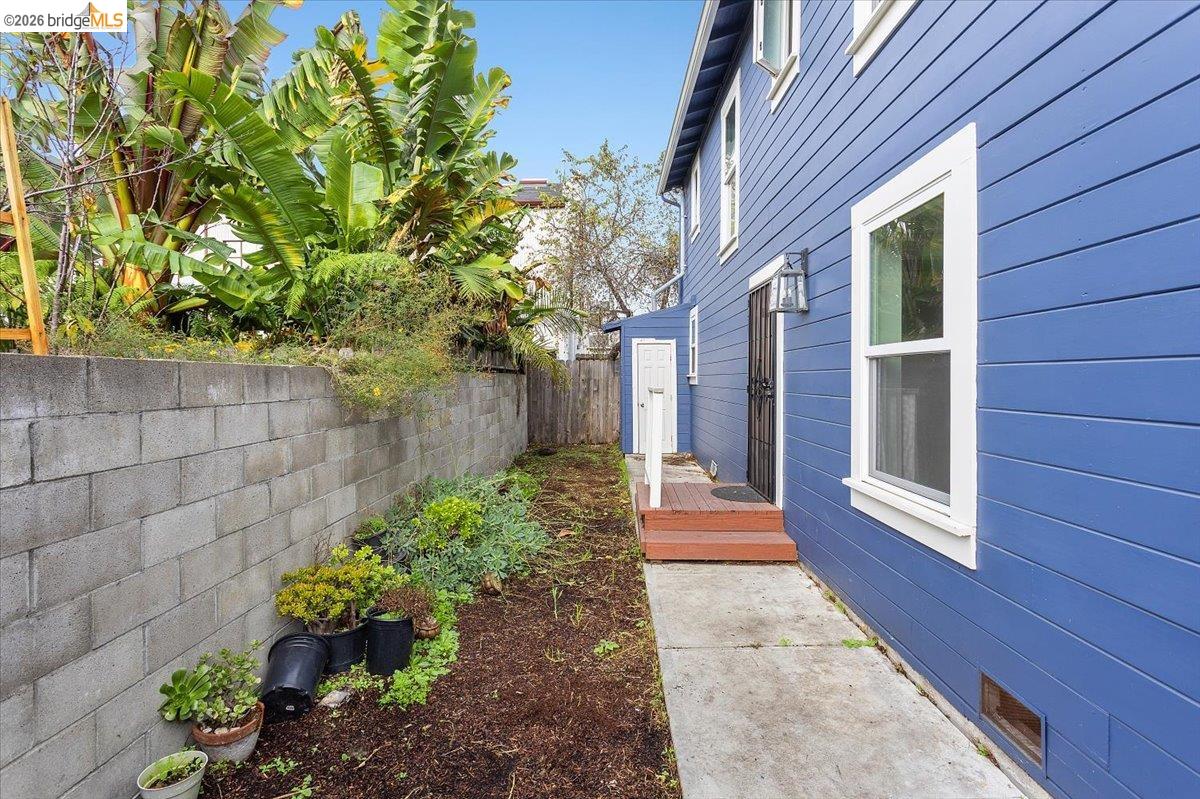 3029 Chestnut Street Oakland, CA 94608 - Photo 15 of 23 a front view of a house with a yard