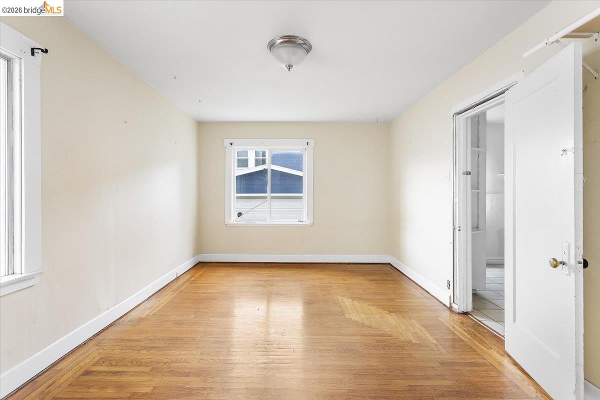 3029 Chestnut Street Oakland, CA 94608 - Photo 20 of 23 a view of an empty room with a window
