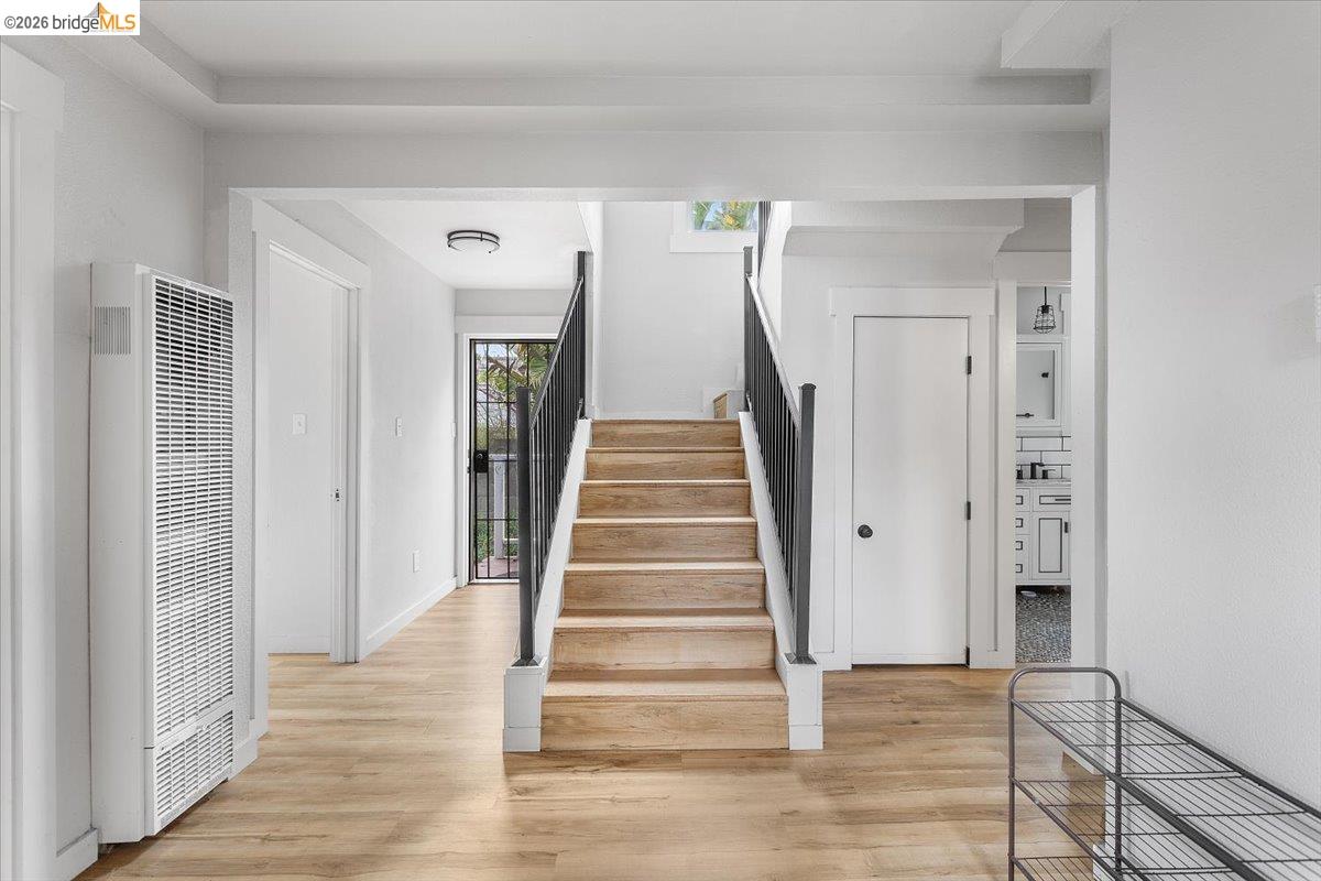 3029 Chestnut Street Oakland, CA 94608 - Photo 9 of 23 a view of an entryway with wooden floor