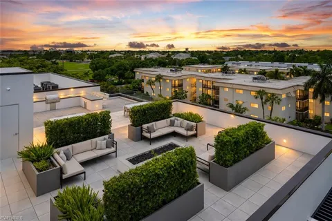 a view of a terrace with seating area