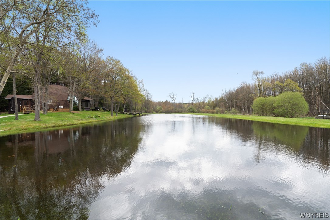 311 Ortner Road Bennington, NY 14040 - Photo 12 of 50 View of pond and home