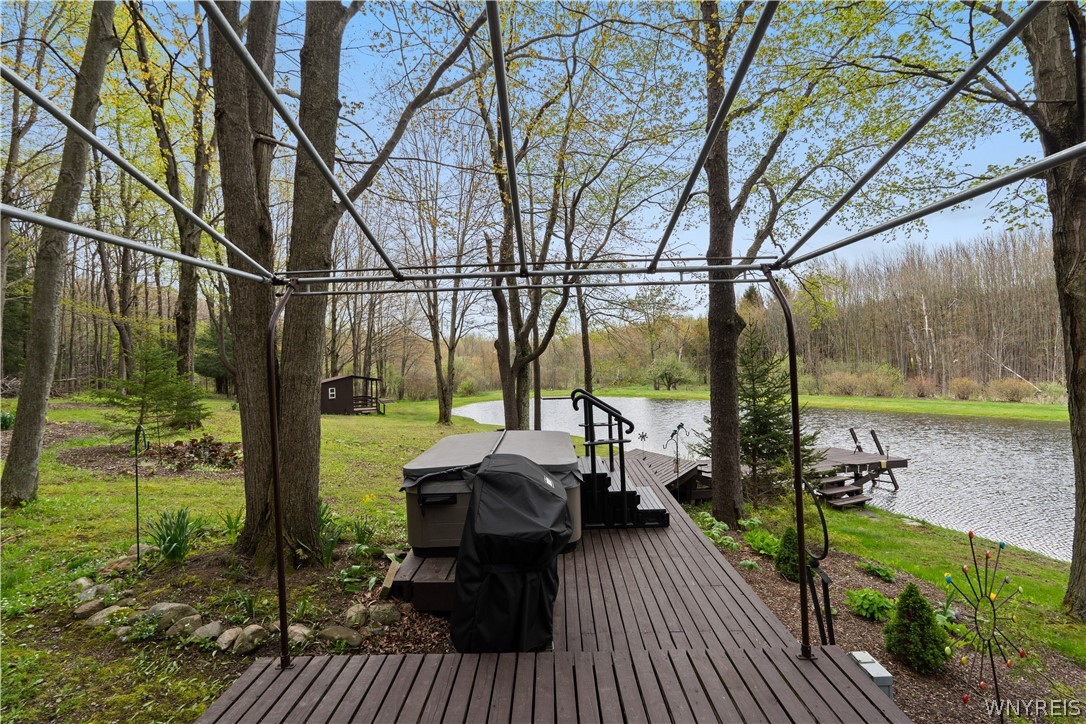 311 Ortner Road Bennington, NY 14040 - Photo 7 of 50 Exterior back with deck and dock to pond