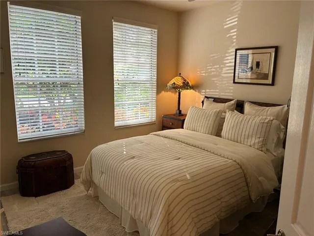 a bathroom with a sink toilet and mirror