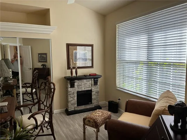 a utility room with cabinets washer and dryer