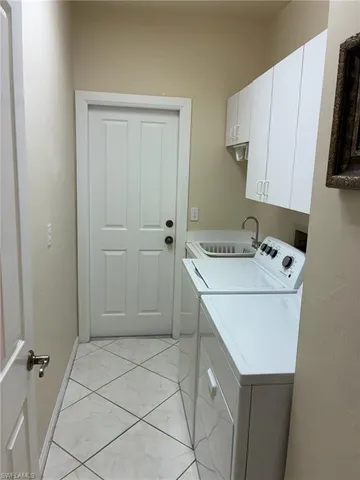 a view of a garage with stairs