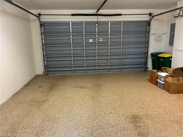 a white bath tub sitting next to a shower