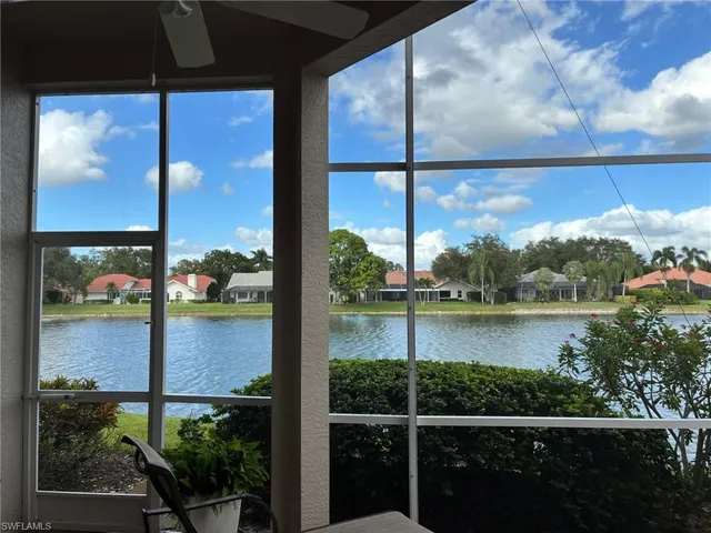 a view of a lake from a window