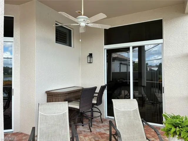 a bedroom with a bed and a chair