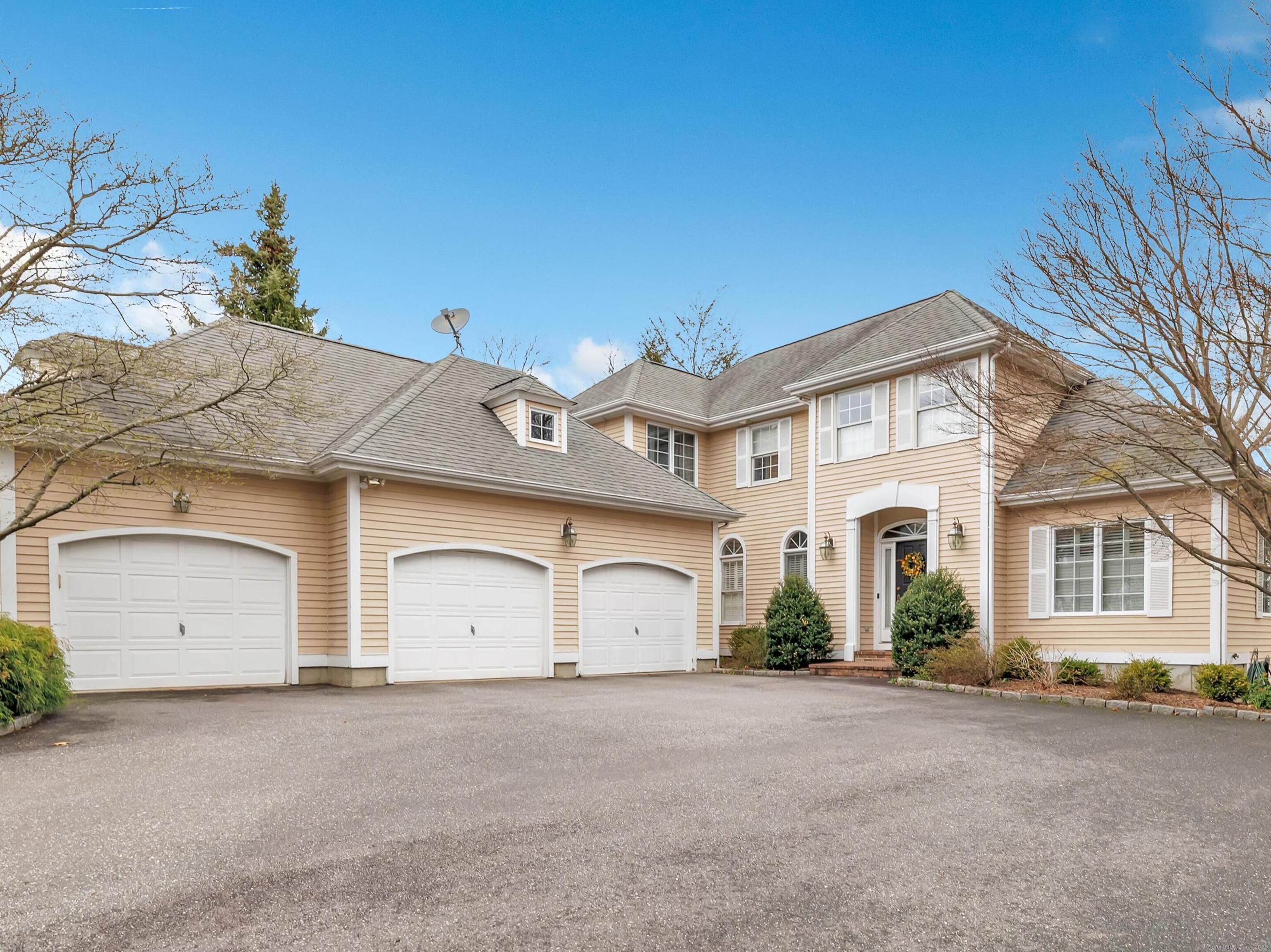 Front of House with 3 Car Garage