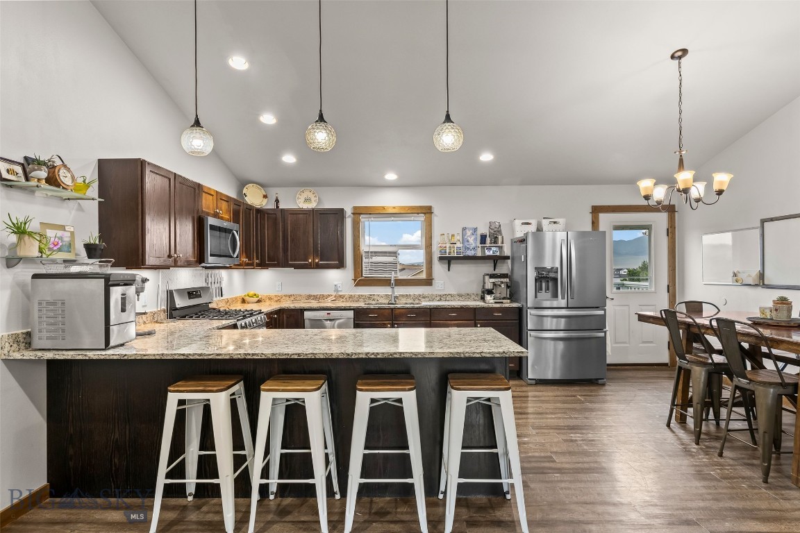 1122 Ridgeview Trail Livingston, MT 59047 - Photo 10 of 75 Brightly lit kitchen with bar seating