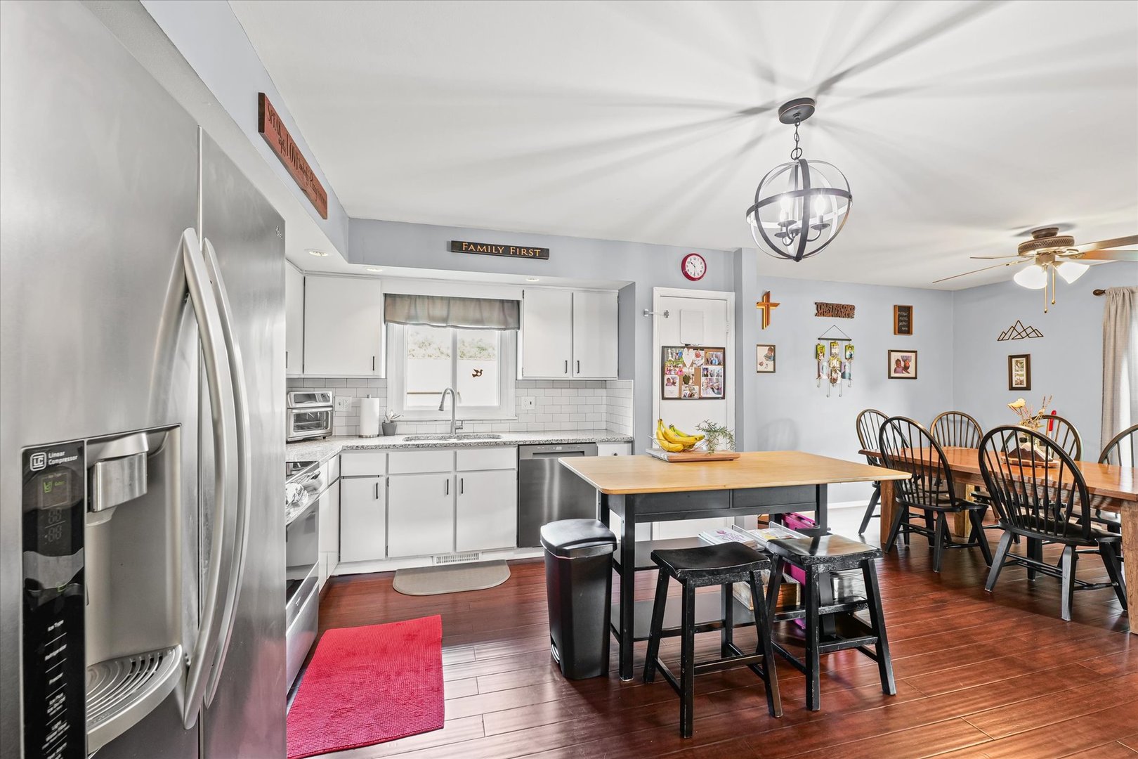 1011 Harrington Drive Champaign, IL 61821 - Photo 14 of 37 a view of a dining room with furniture window and wooden floor