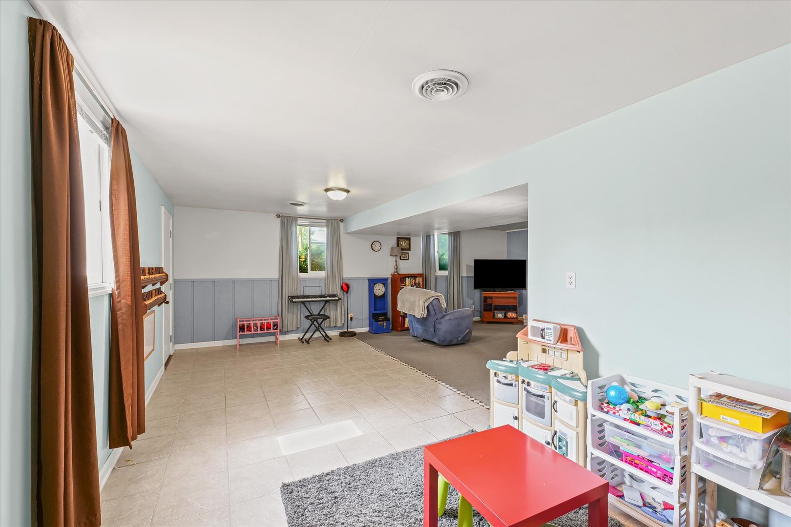 1011 Harrington Drive Champaign, IL 61821 - Photo 22 of 37 a view of a room with toys and a couch