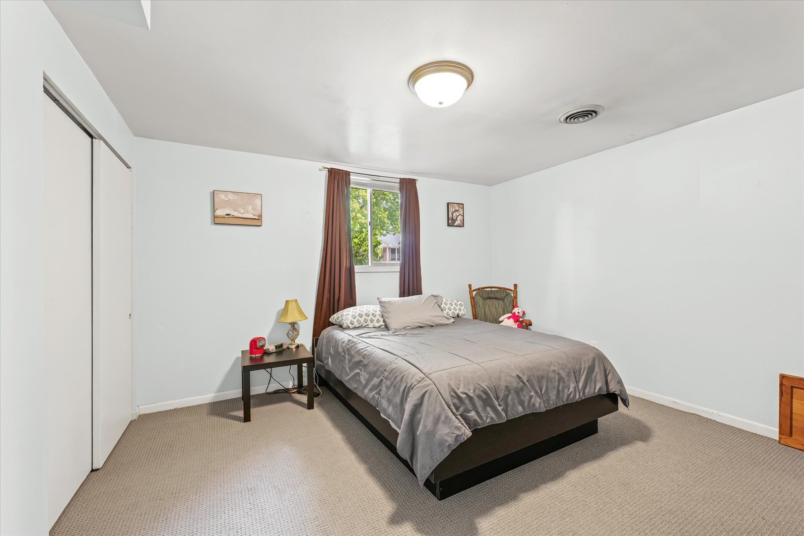 1011 Harrington Drive Champaign, IL 61821 - Photo 28 of 37 a bedroom with a bed and a window