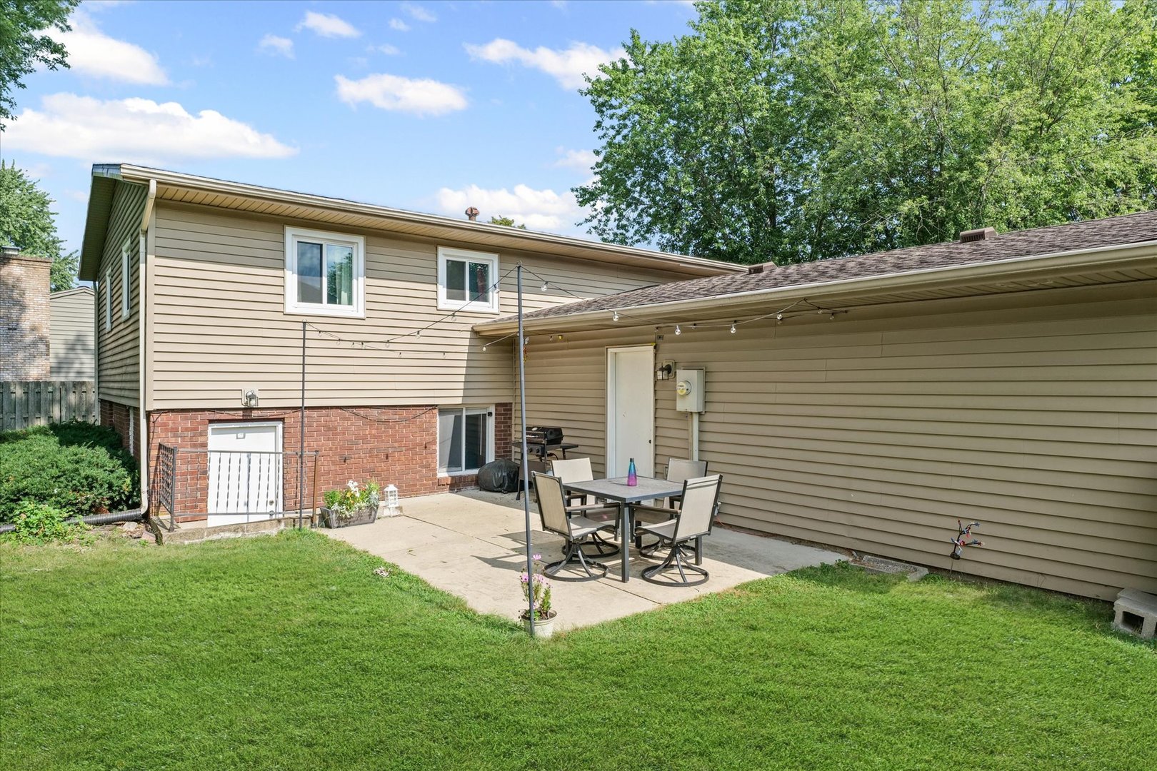1011 Harrington Drive Champaign, IL 61821 - Photo 36 of 37 a house view with a sitting space and garden space