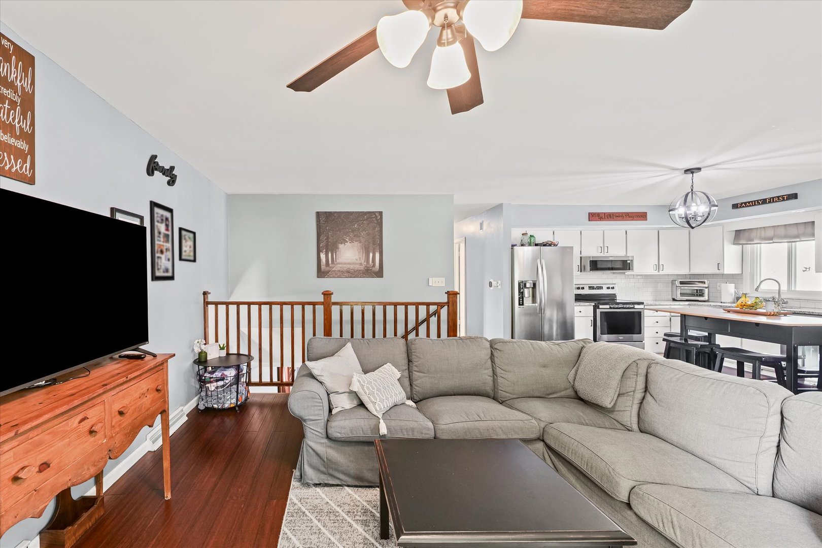 1011 Harrington Drive Champaign, IL 61821 - Photo 5 of 37 a living room with furniture and a flat screen tv