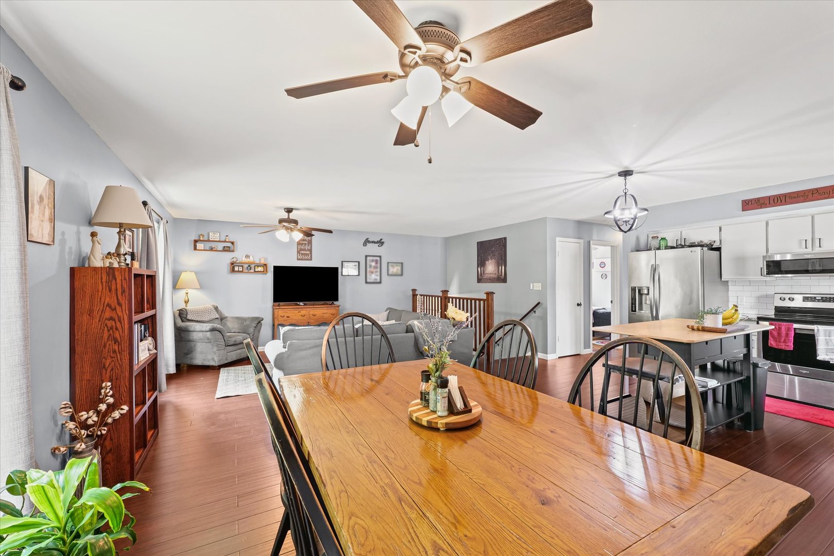 1011 Harrington Drive Champaign, IL 61821 - Photo 8 of 37 a view of a dining room with furniture and wooden floor