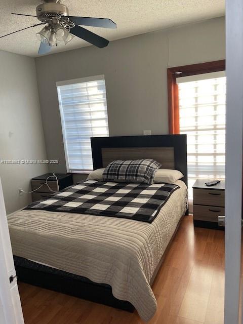 8340 Northwest 8th Street, Unit N12 Miami, FL 33126 - Photo 18 of 21 a bedroom with a bed and a window