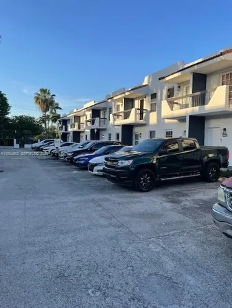 a car parked in front of a house