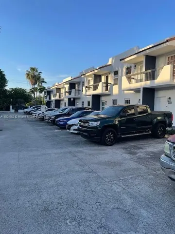 a car parked in front of a house