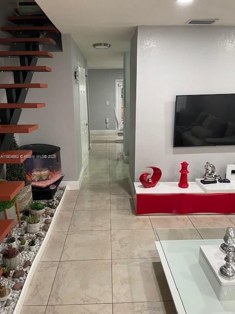 8340 Northwest 8th Street, Unit N12 Miami, FL 33126 - Photo 2 of 21 a living room with furniture and a flat screen tv