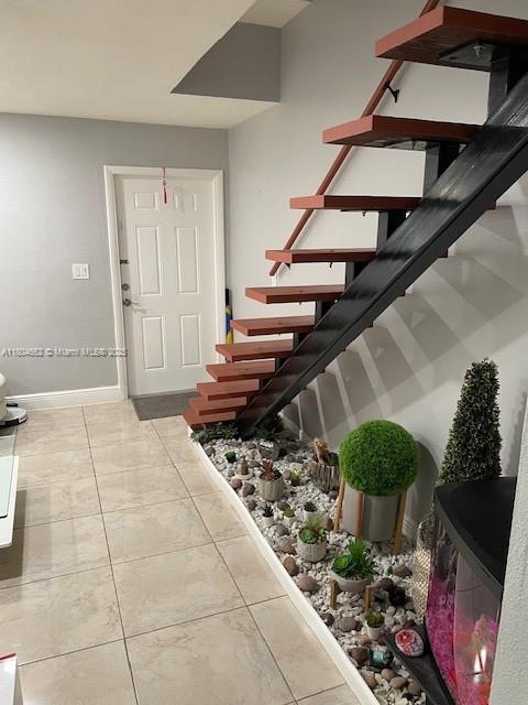 8340 Northwest 8th Street, Unit N12 Miami, FL 33126 - Photo 4 of 21 a view of entryway and hall with wooden floor