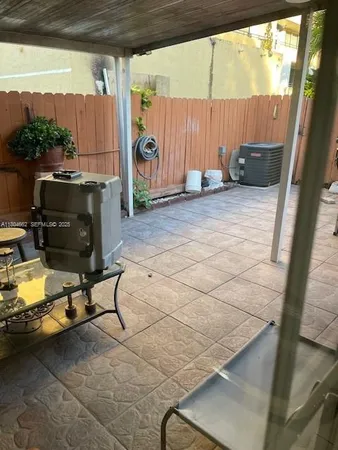 a view of outdoor space with seating area