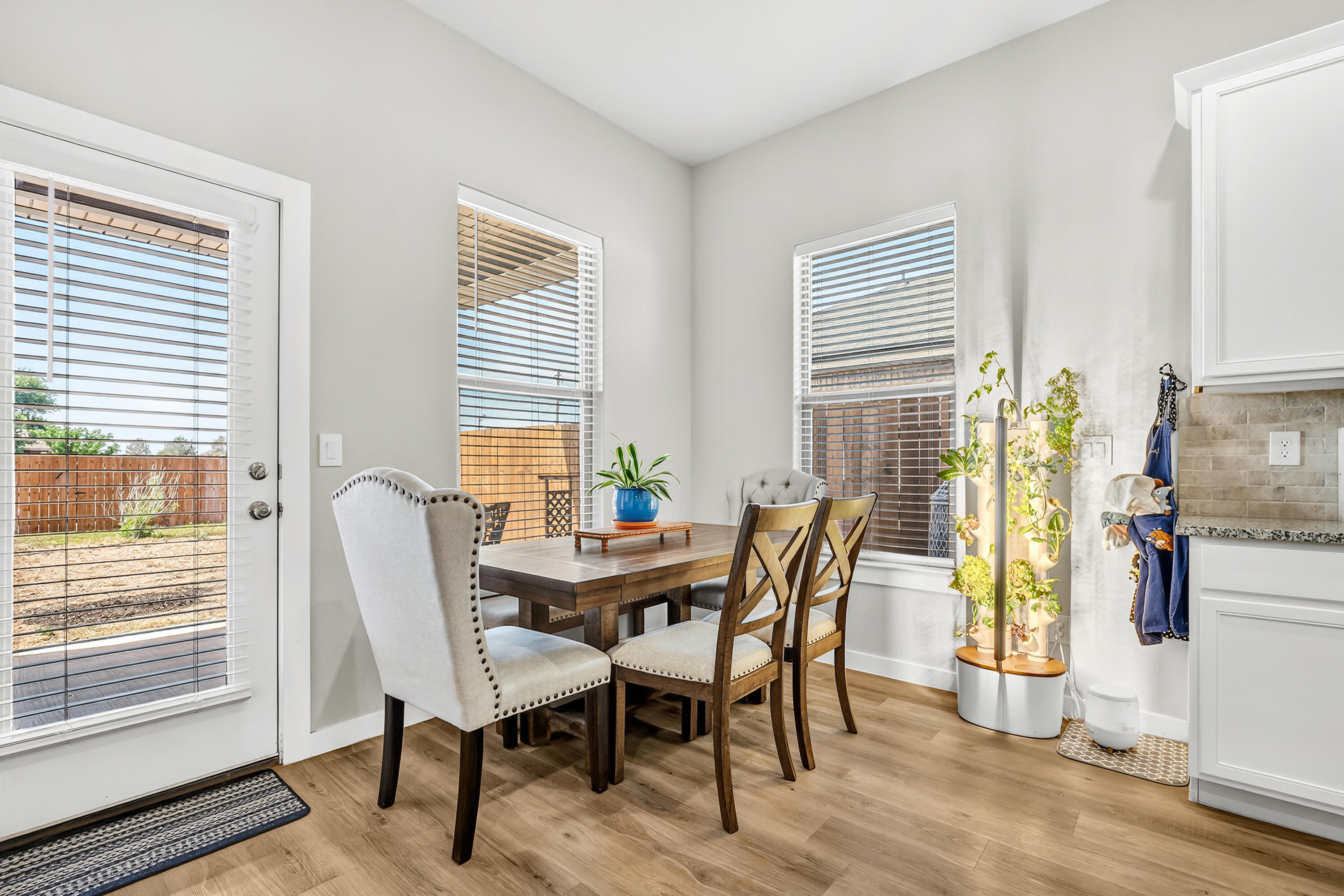 7231 29th Street Lubbock, TX 79407 - Photo 13 of 23 a view of a dining room with furniture and a window