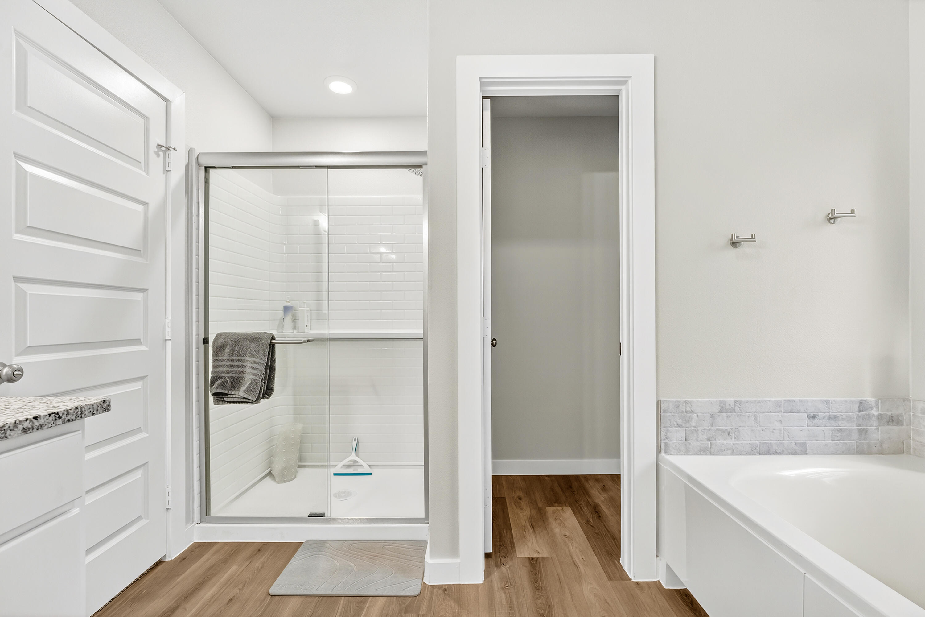 7231 29th Street Lubbock, TX 79407 - Photo 20 of 23 a bathroom with a glass shower door