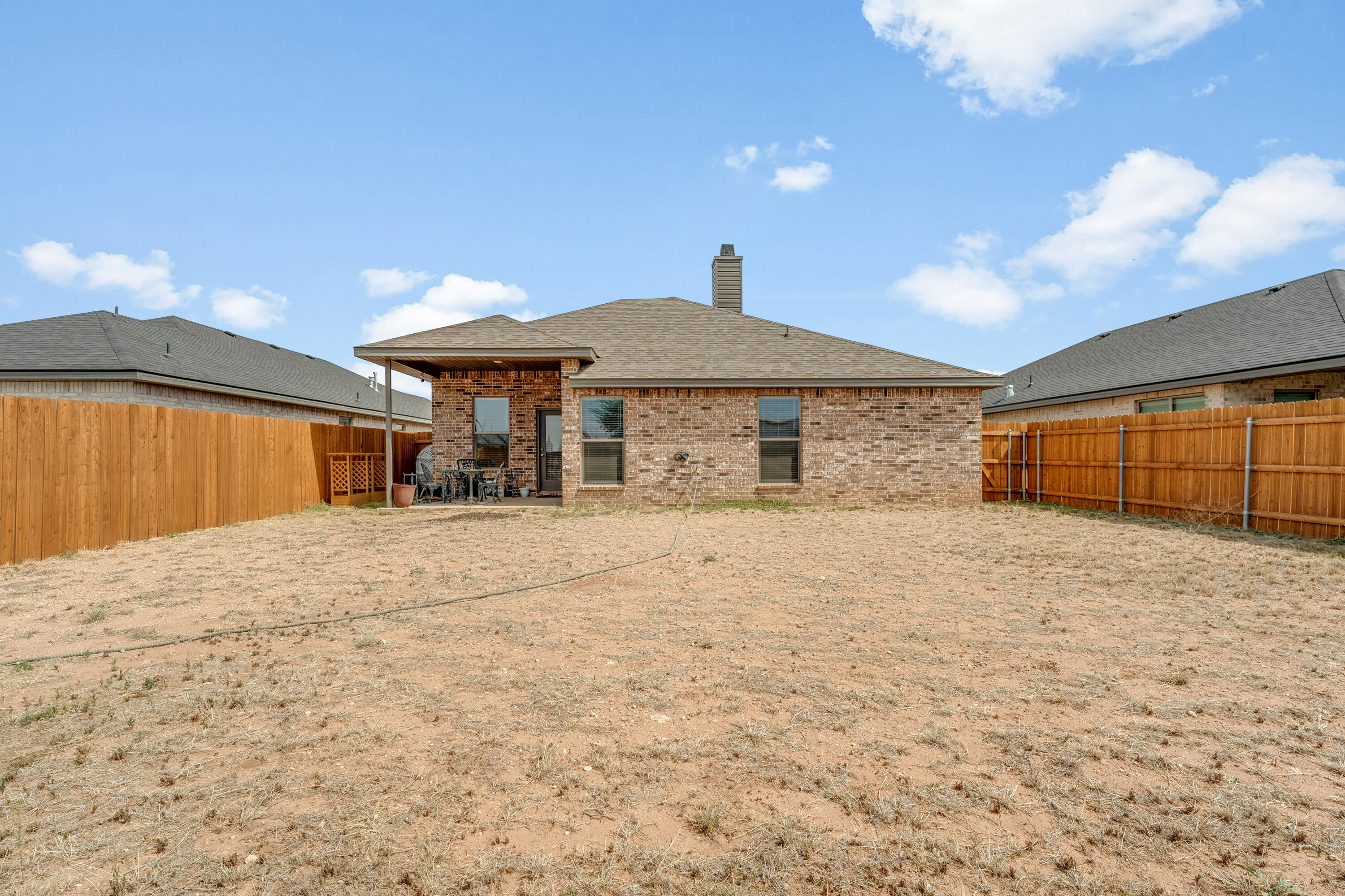 7231 29th Street Lubbock, TX 79407 - Photo 22 of 23 a house view with a backyard space