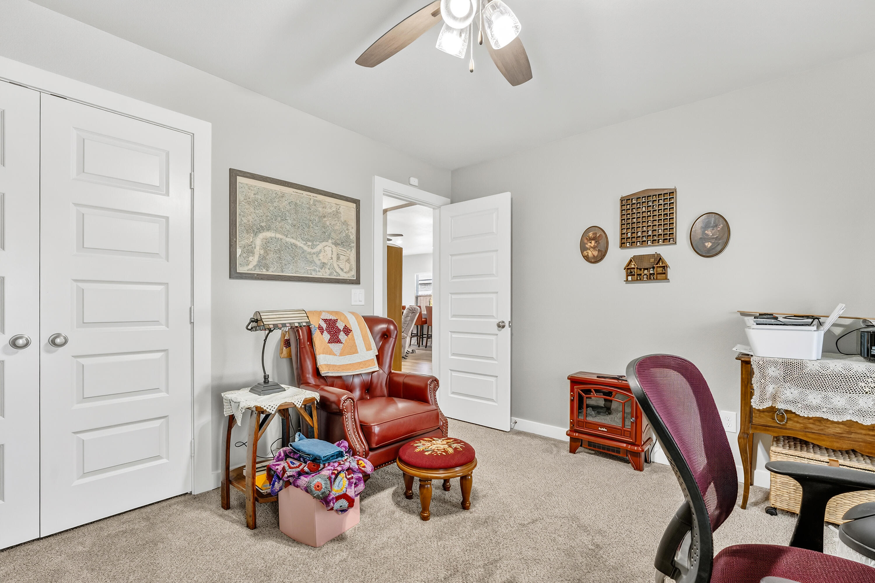 7231 29th Street Lubbock, TX 79407 - Photo 6 of 23 a view of a workspace with furniture