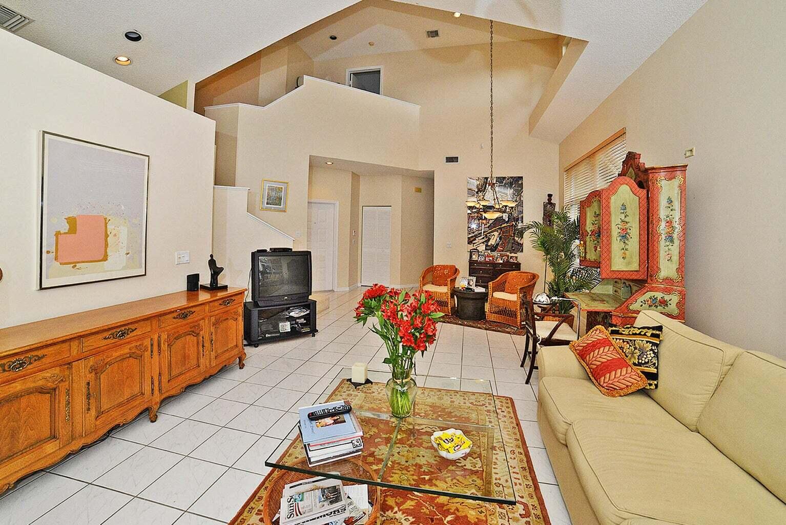 6695 Northwest 25th Court Boca Raton, FL 33496 - Photo 1 of 40 a living room with furniture