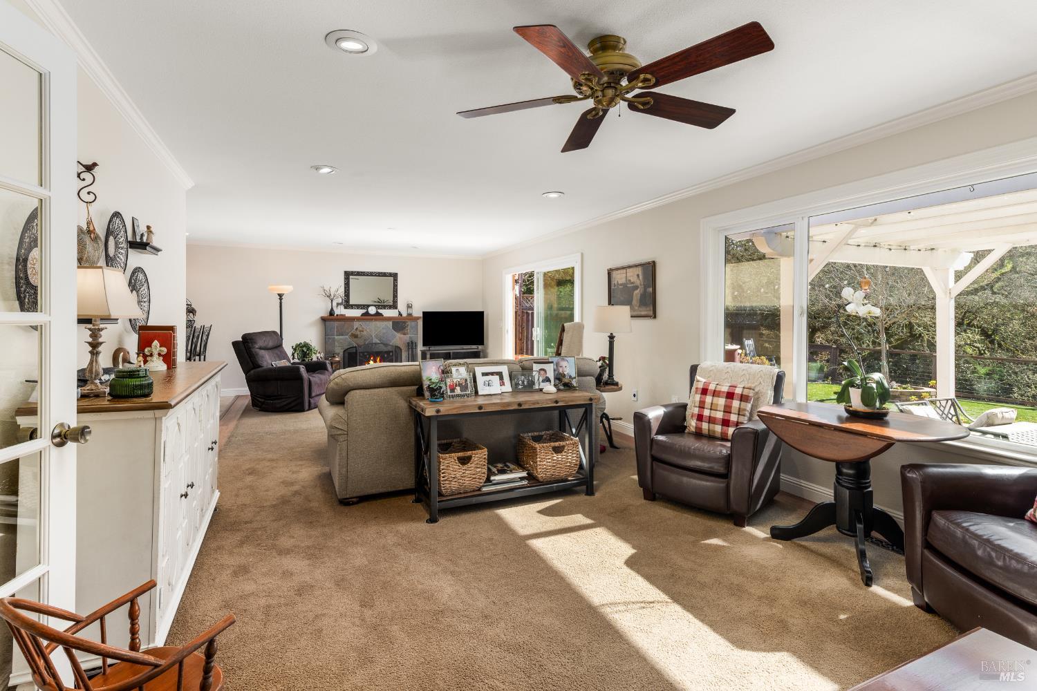 5960 Yerba Buena Road Santa Rosa, CA 95409 - Photo 8 of 17 a living room with furniture and a flat screen tv